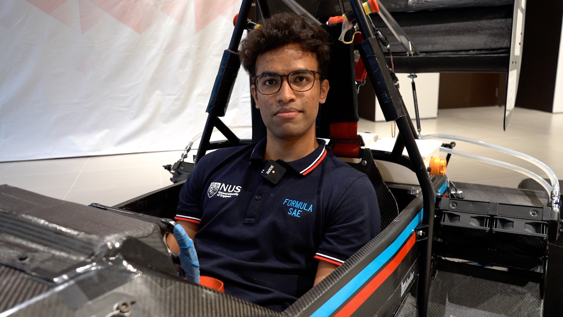 Team member and test-driver Ananth Shanmugam  at the wheel of the R22e