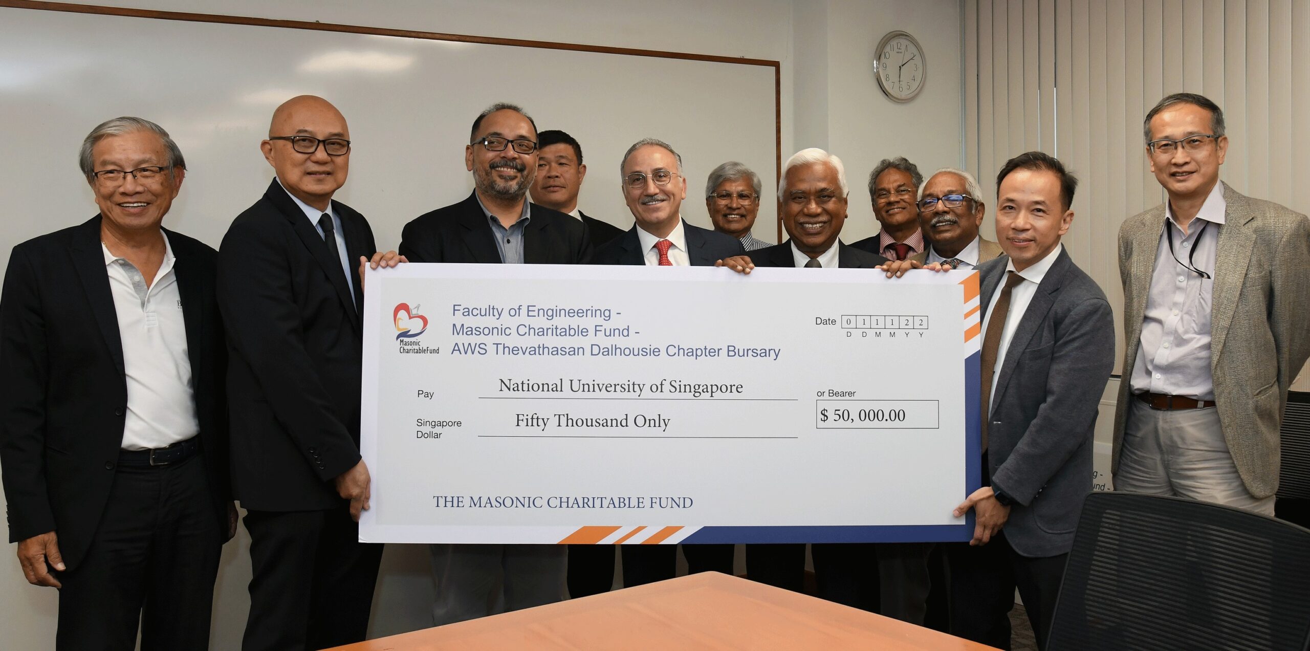 Mr Paul Yong Way, Dr Ivor Thevathasan and Dr Brian Shegar and AWS Thevathasan Family and Reps of Dalhousie Chapter presented the second cheque to CDE Dean Prof Aaron Thean on behalf of the Masonic Charitable Fund.