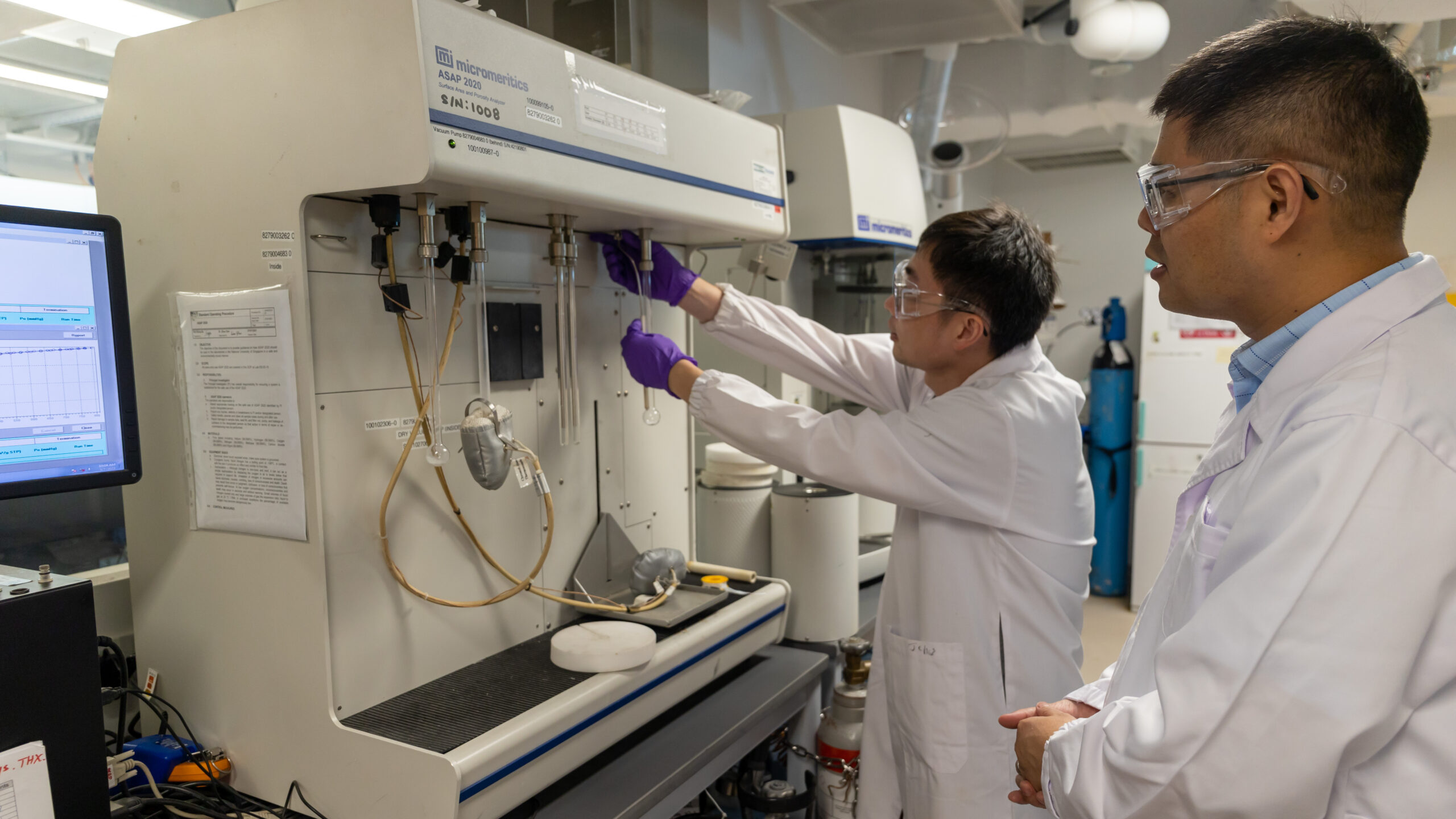 The research was led by Asst Prof Zhao Dan (right) pictured with research fellow Dr Kang Chengjun.