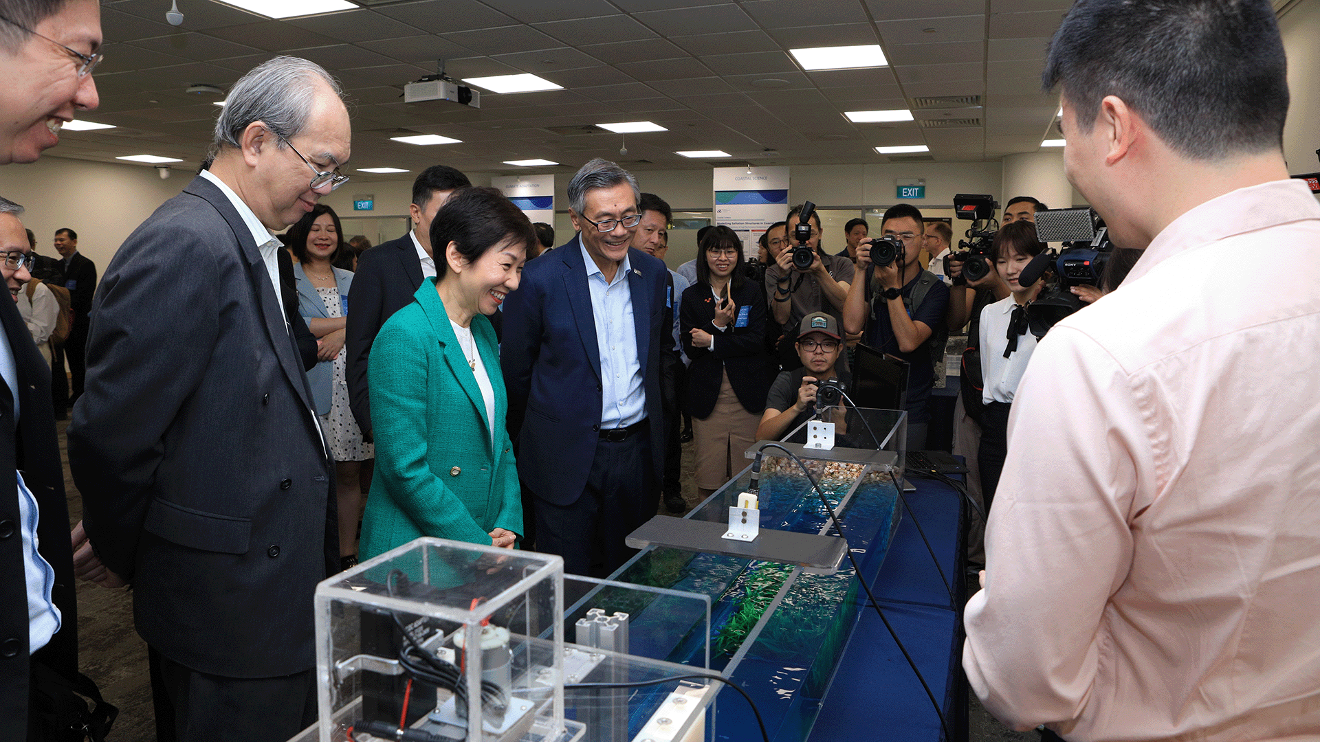 MInister Grace Fu toured an exhibition showcasing some of the launch projects CFI Singapore has embarked on.