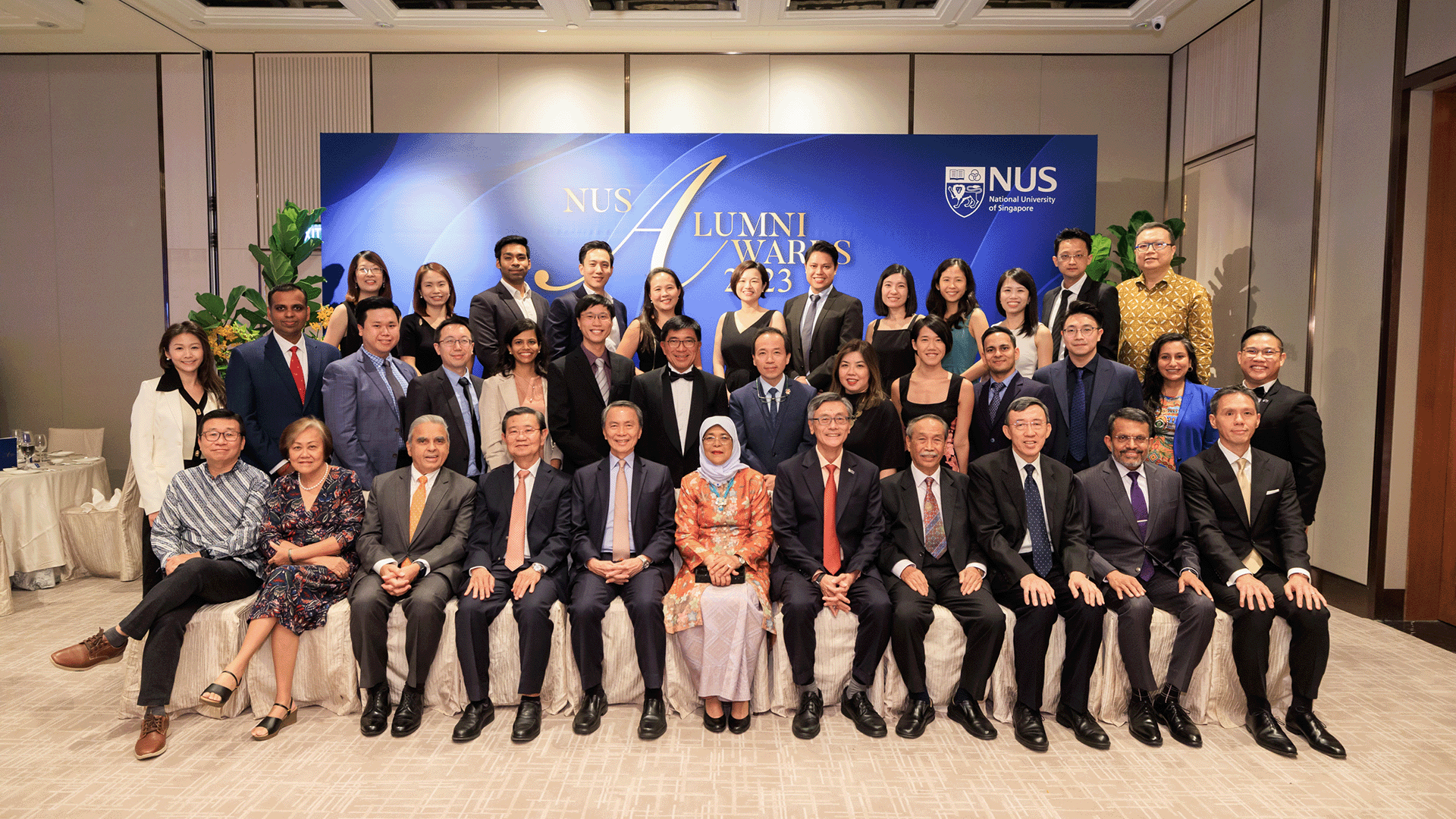 Former President of the Republic of Singapore Mdm Halimah Yacob (centre) with other award recipients.