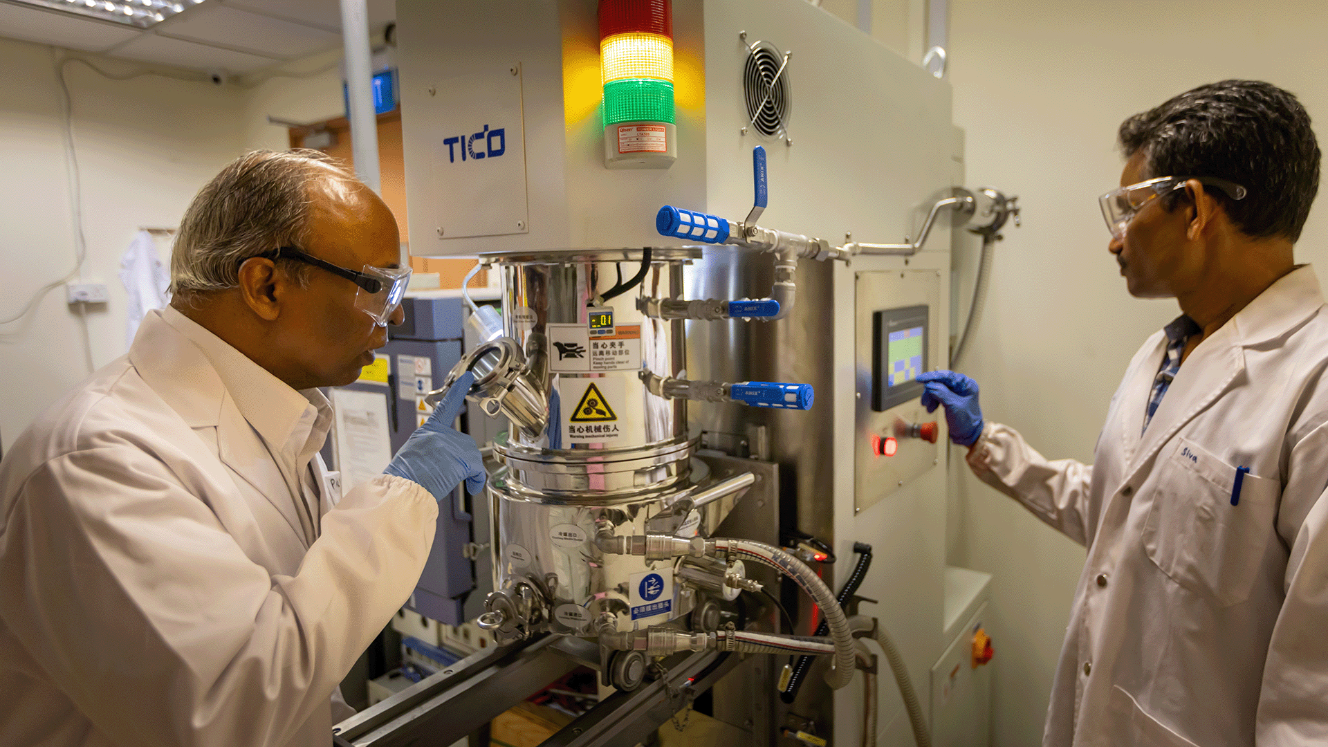 Assoc Prof Balaya in the Battery Research Lab, pictured with (right) Senior Research Fellow Dr. Sivakkumar S. R. 