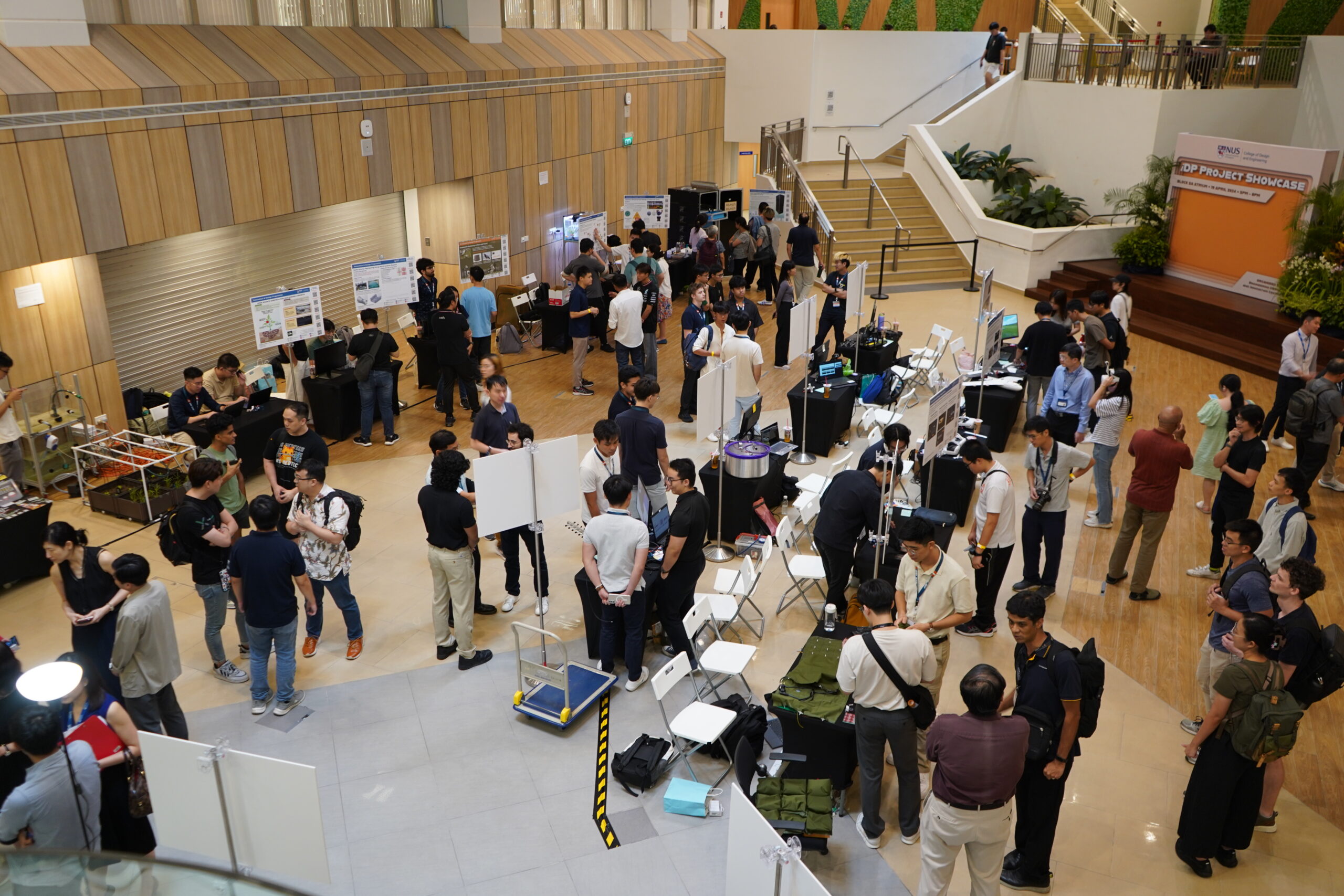 The booths were crowded throughout the evening, with many interested in learning about the various student projects.
