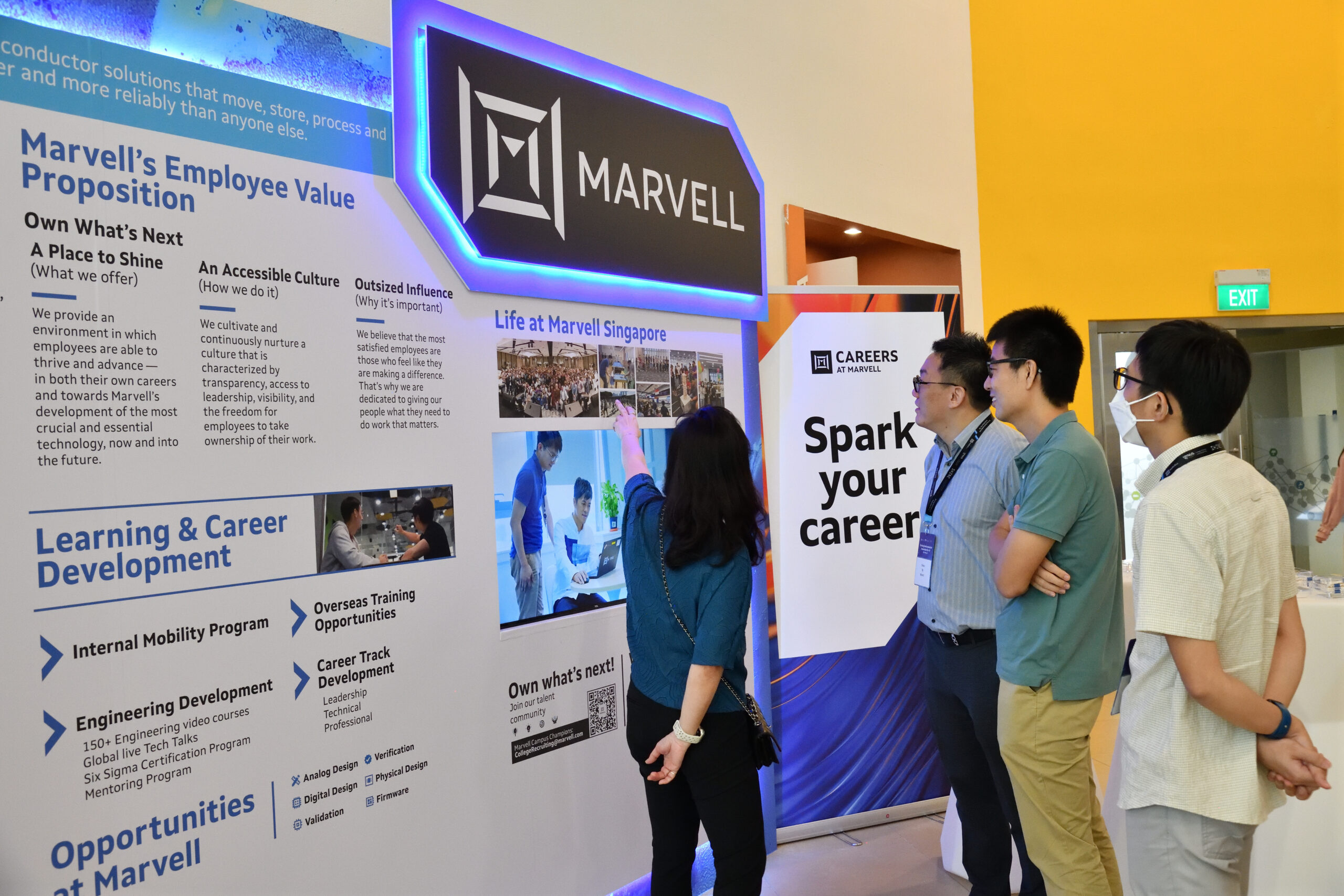Participants looking at the career opportunities and programmes available at Marvell. 