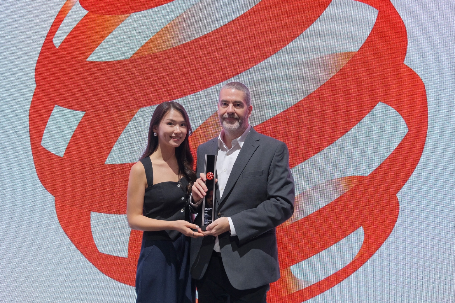 Poh Yun Ru (left) and Assoc Prof Gaubert (right) at the Red Dot Design Award 2024 ceremony 