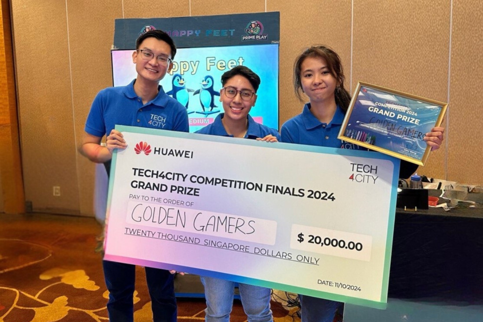 From left to right: Jonathon Leong, Fatin Sharafana and Denise Caluza winning the Tech4City competition