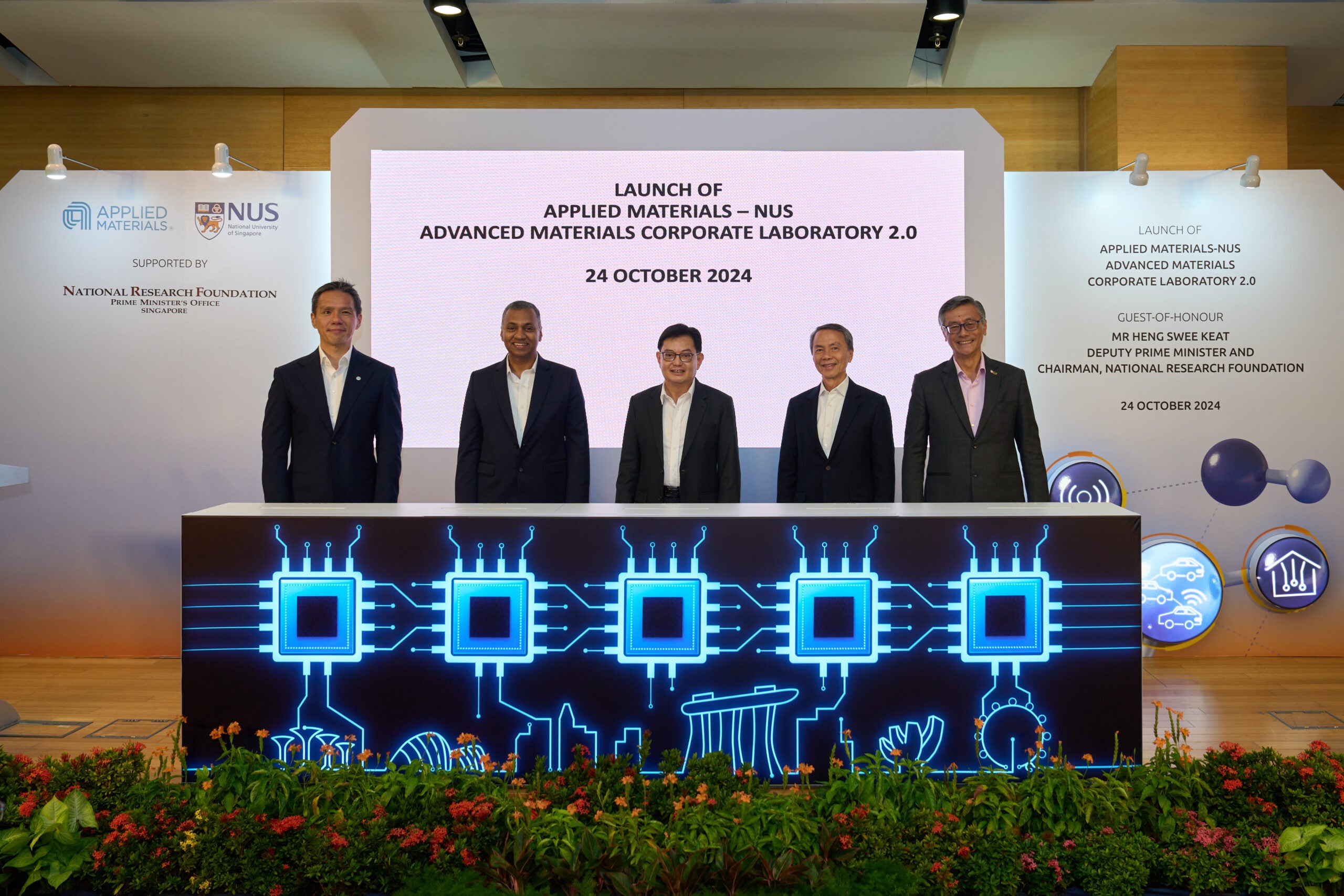 Photo 1 Phase II of the Applied Materials-NUS Advanced Materials Corporate Lab was launched by Guest-of-Honour Deputy Prime Minister and Chairman of the National Research Foundation, Mr Heng Swee Keat (middle). From left to right: Mr Brian Tan, Regional President (Southeast Asia), Applied Materials; Dr Satheesh Kuppurao, Group Vice President, Applied Materials; Mr Heng Swee Keat, Deputy Prime Minister and Chairman, National Research Foundation; Mr Hsieh Fu Hua, Chairman, NUS Board of Trustees; and Professor Tan Eng Chye, President, NUS.