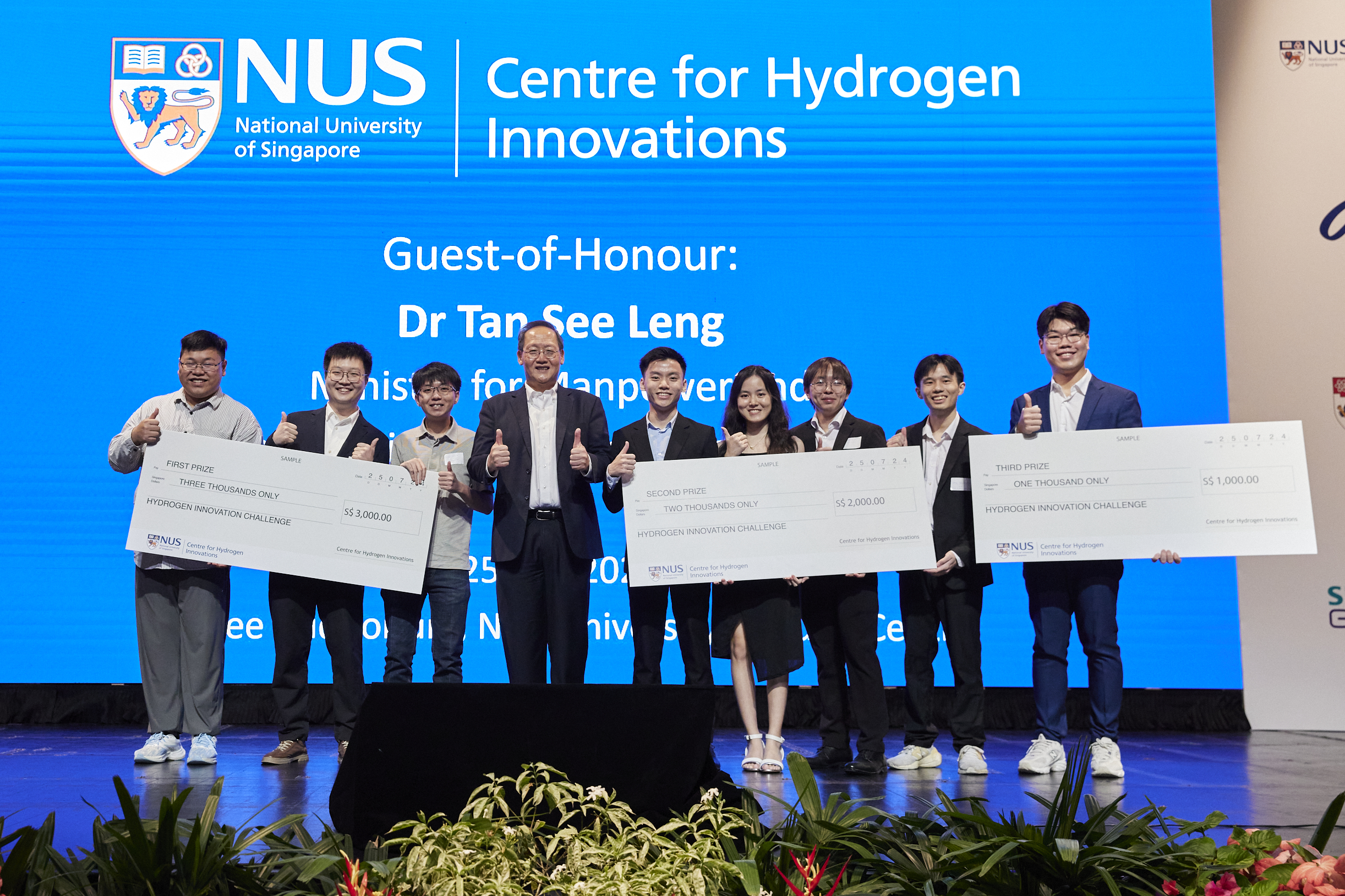 Group photo of the teams at the award presentations with the Guest-of-Honour Dr Tan See Leng (4th from Left), Raymand Tey (5th from Left) and Sean Jean Moey, who claimed the First Runner-Up Award with a $2000 prize, and Seung Jun Lee (1st from Right) and Adhvika M., who secured the Second Runner Up spot with a $1000 prize.