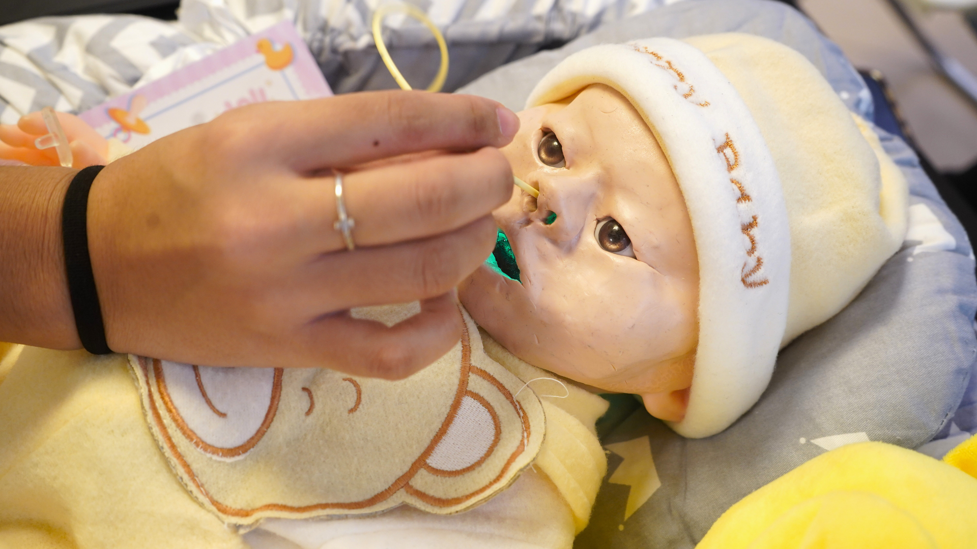 The doll allowed visitors to try their hand inserting the nasogastric tube.