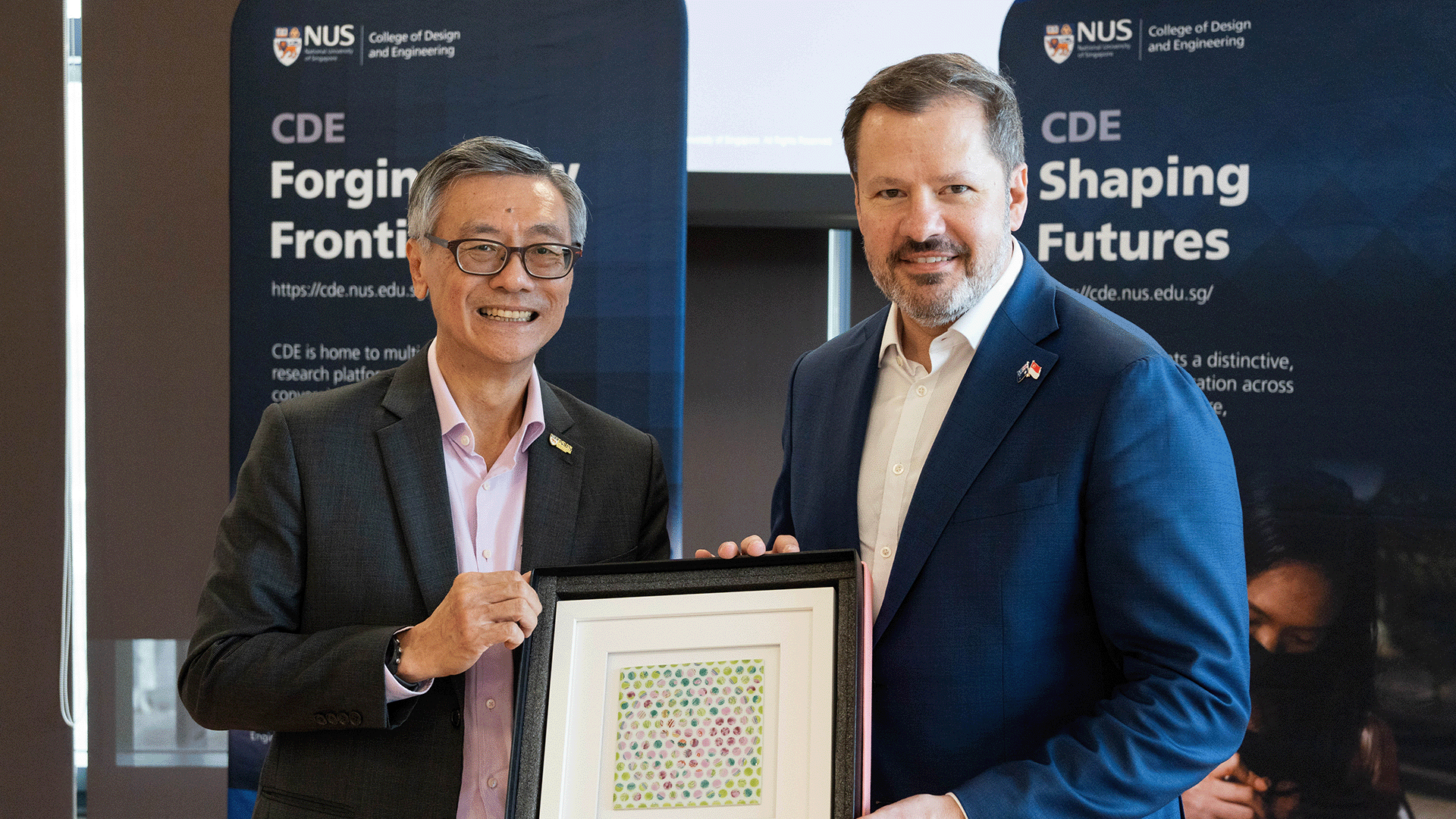 The funding was announced by Australia’s Minister for Industry and Science, the Hon Ed Husic MP (right), pictured with NUS President, Prof Tan Eng Chye.