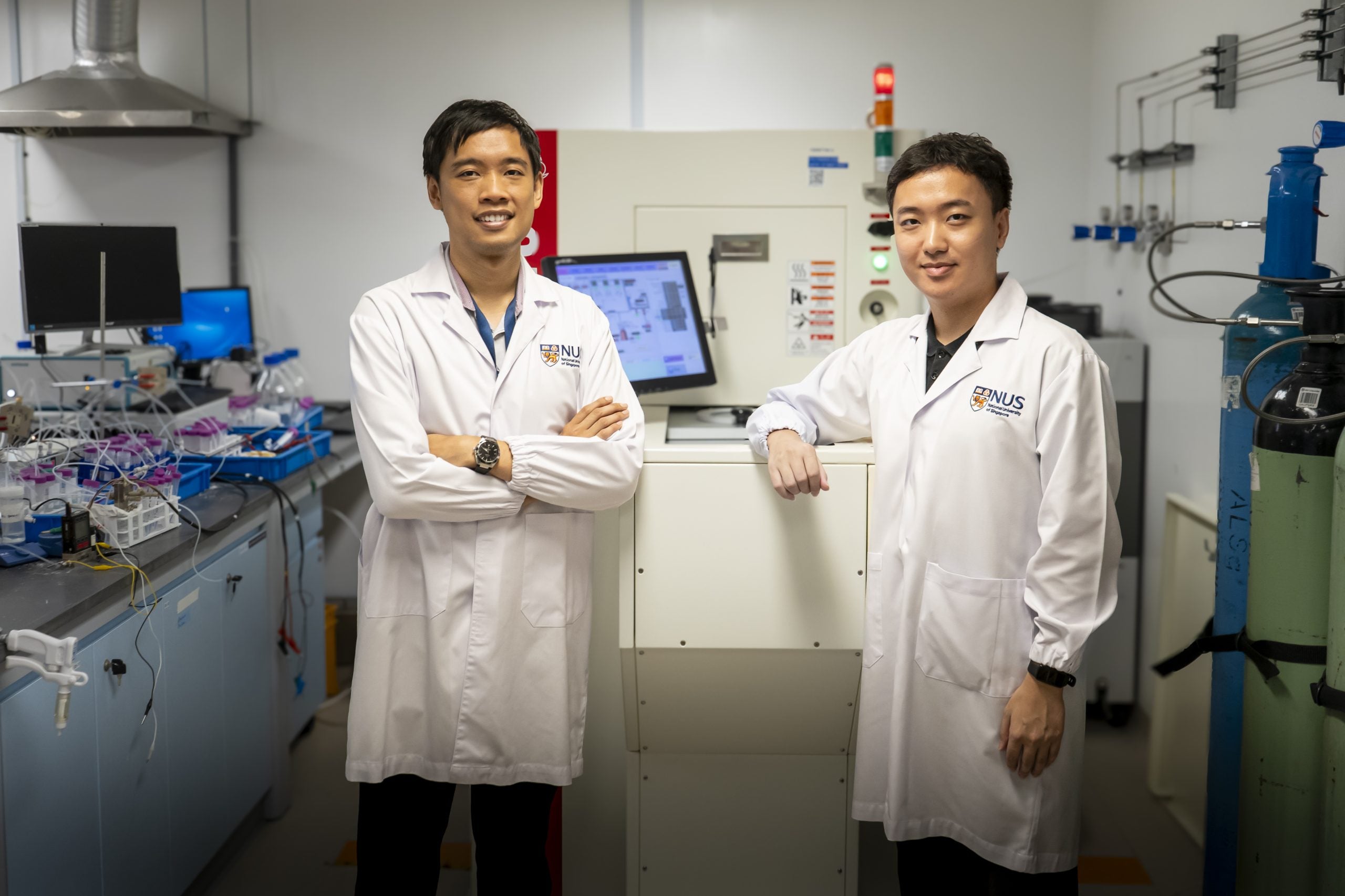 Assistant Prof Lum Yanwei (left) who led the study, pictured with PhD student Zhang Jiguang.