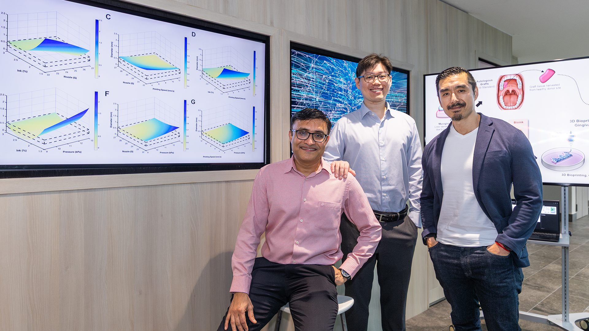 Photo 1 Asst Prof Gopu Sriram (left) and Dr Jacob Chew (middle) from NUS Faculty of Dentistry, together with Prof Dean Ho (right) from the Department of Biomedical Engineering.
