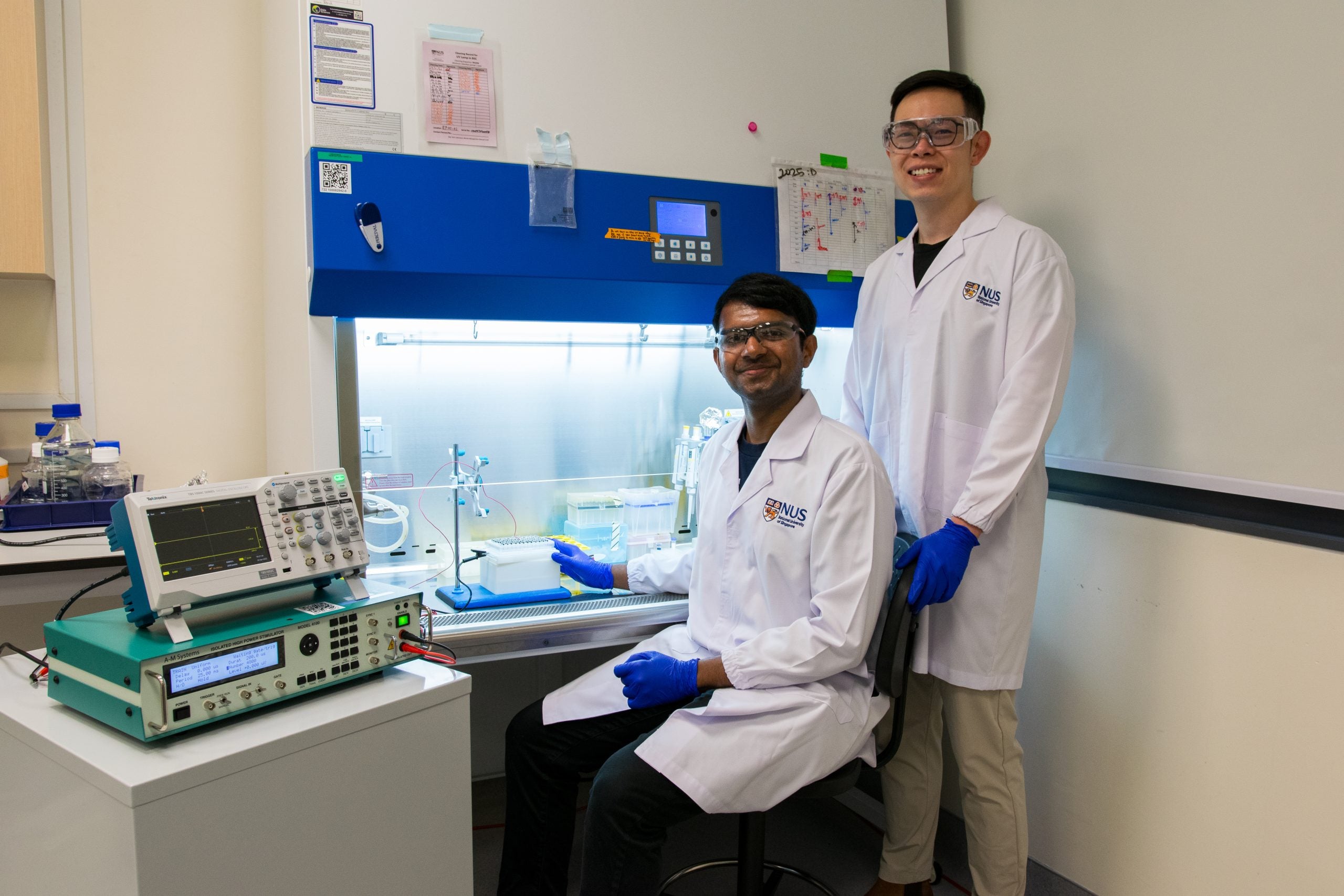 Assistant Professor Andy Tay (right), Mr Arun Kumar (left) and their team have developed an innovative ‘food delivery service’ - known as Nanostraw Electro-actuated Transfection (NExT) - to transport cancer-fighting genes efficiently to immune cells, boosting their ability to detect and kill cancer cells.