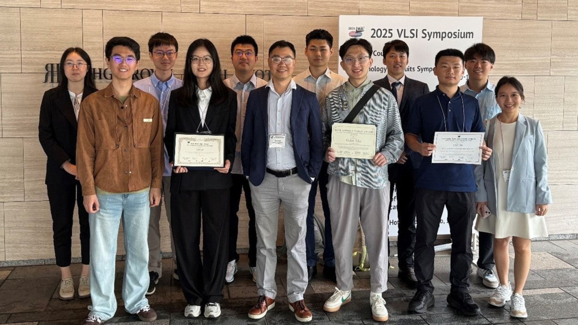 Gong Xiao VLSI Symposium 2025 Assoc Prof Gong Xiao (centre) with his research team at the 2025 Symposium on VLSI Technology and Circuits in Kyoto, Japan, where the group received multiple awards and recognitions for their contributions to semiconductor device research.