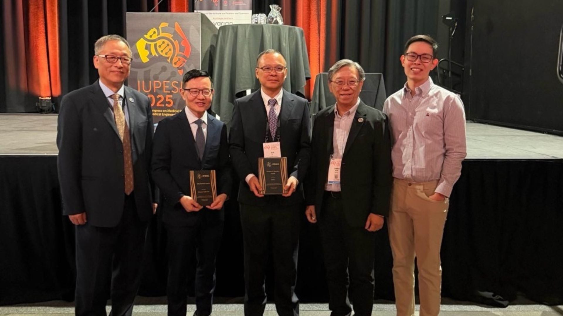Prof Lin Kang-Ping (extreme left), President of IFMBE, with Prof Lim Chwee Teck (second from left,) Prof Li Jun (middle), Emeritus Prof James Goh (second from right) and Asst Prof Andy Tay (extreme right).