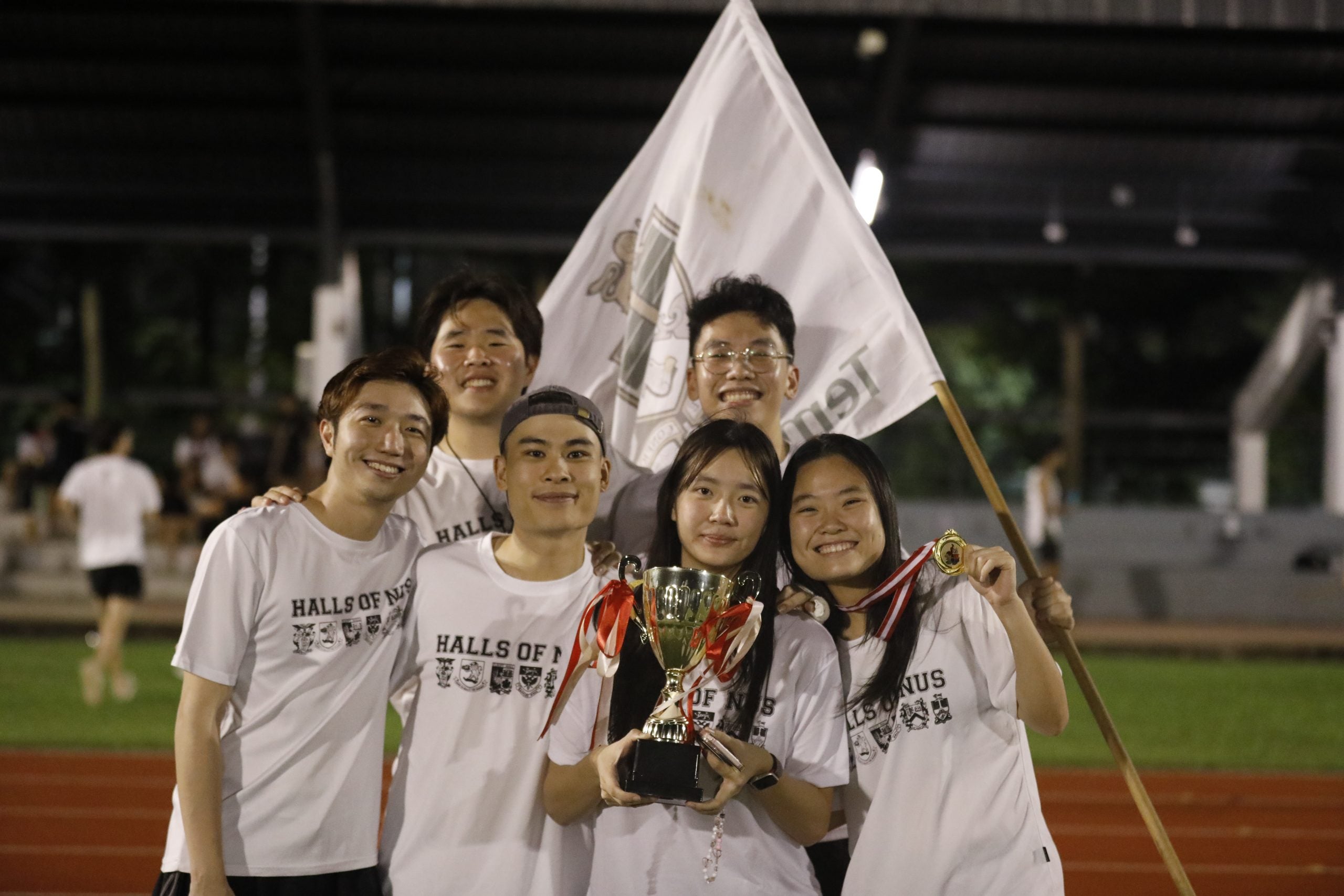 Liu Congzhi (top row, first on left) with his fellow Junior Common Room Committee members at the Inter-Hall Games closing ceremony