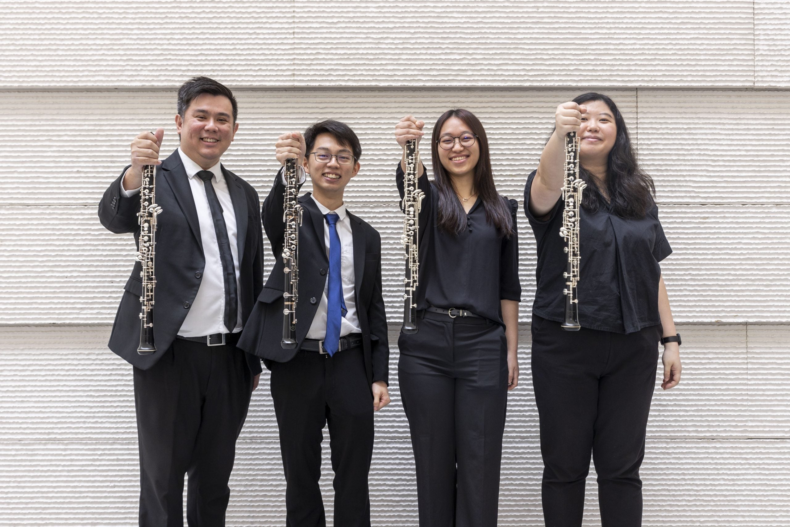 Chia Min Shen (second from left) with his NUSSO Mahler Symphony No.1 Oboe Section members