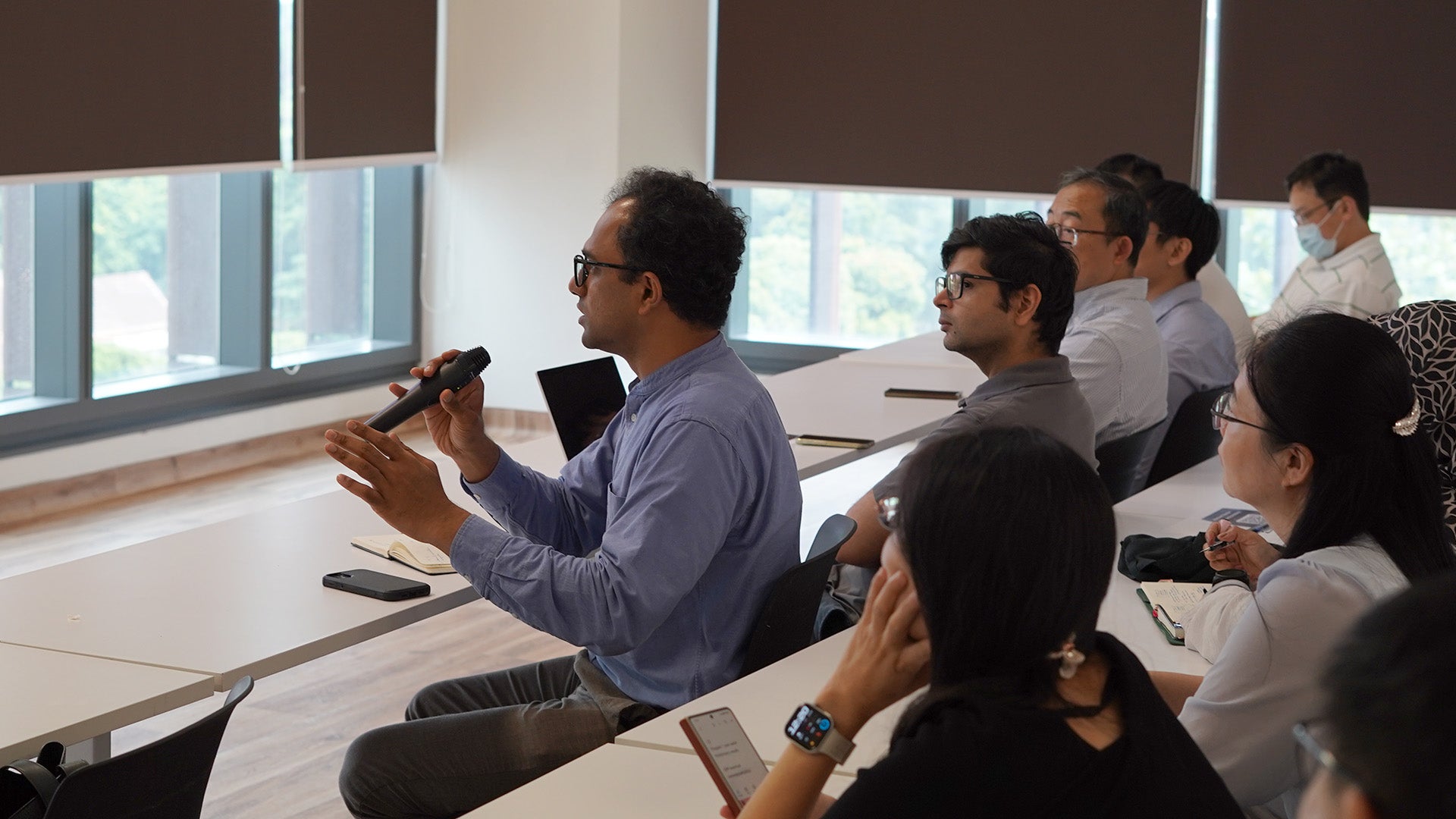 Audience member asking question at the grantsmanship workshop.