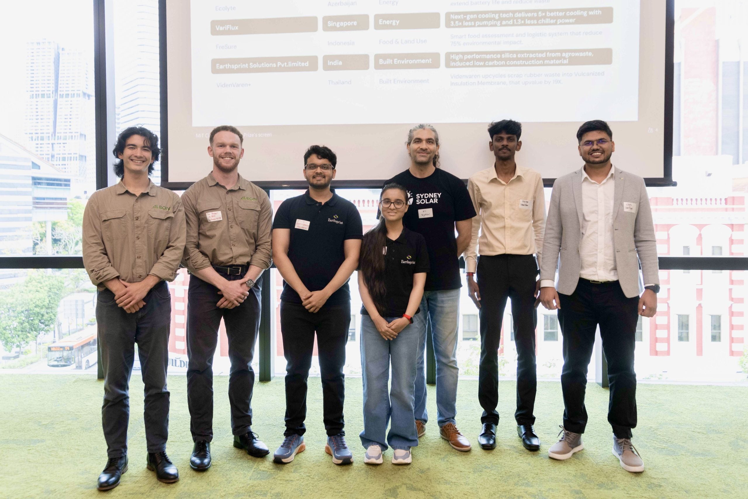 Vikas Dhamu (first from right) and Meyyappan Kannan (second from right) at the regional semifinals in Singapore.