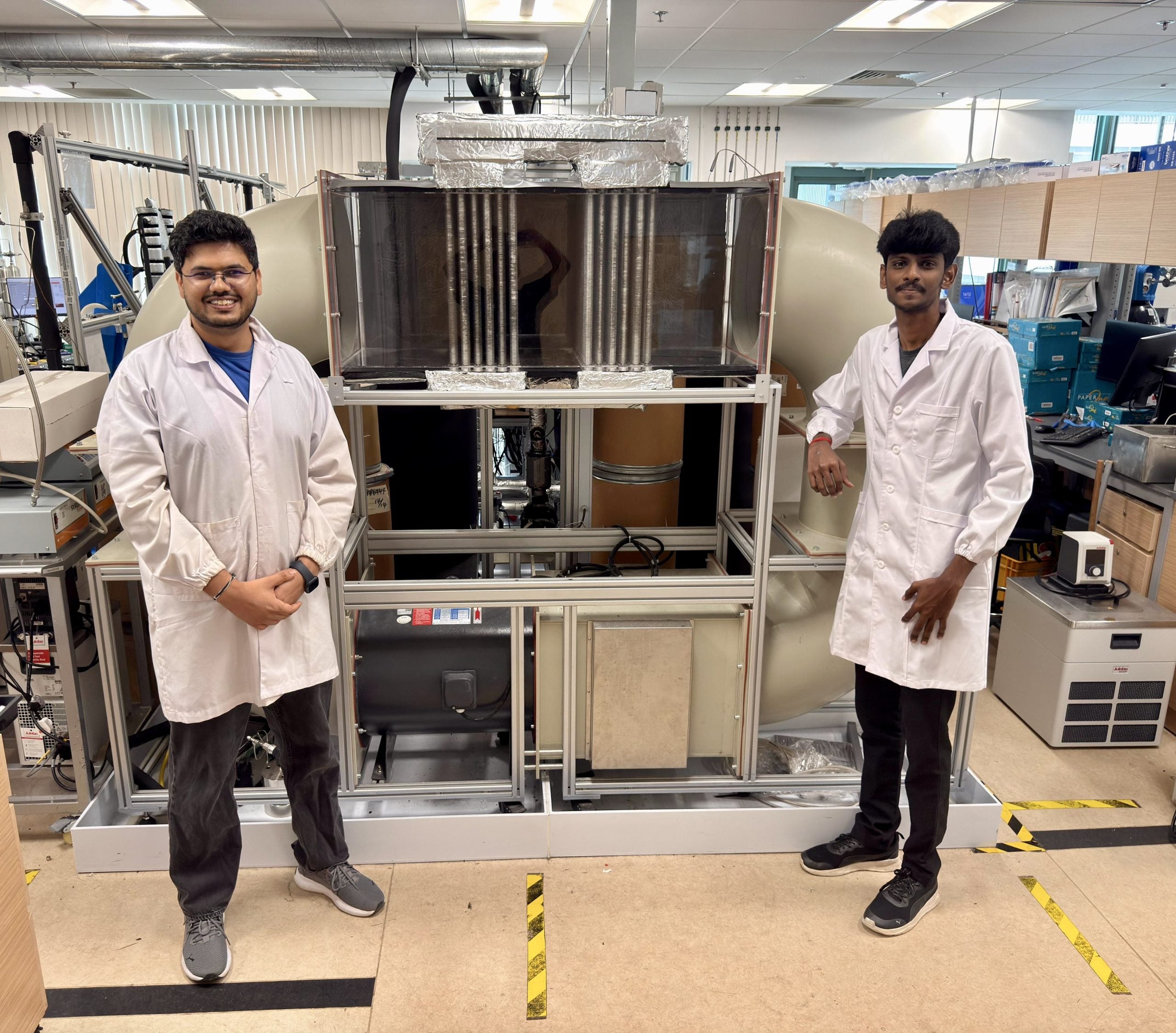 Research Fellow Vikas Dhamu (L) and first-year PhD student Meyyappan Kannan (R) represent team VariFlux.