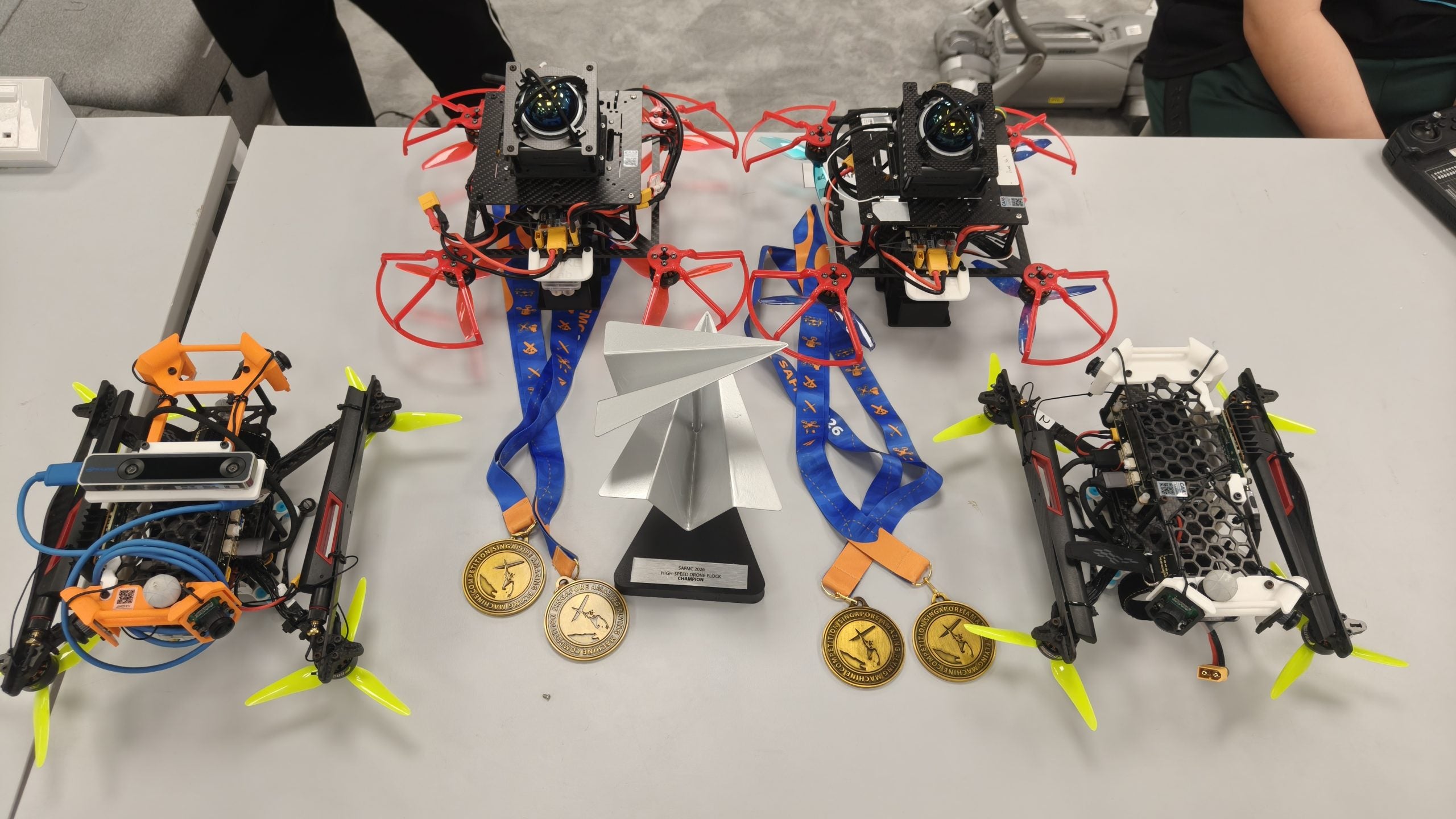 NUS Aero Intelligence High-Speed Drone Flock