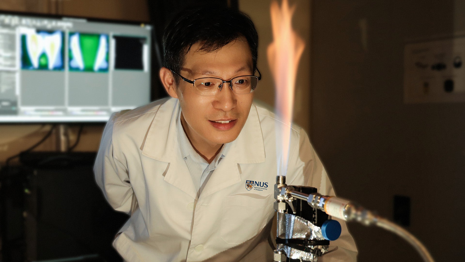 Assoc Prof Zhang Huangwei at work.