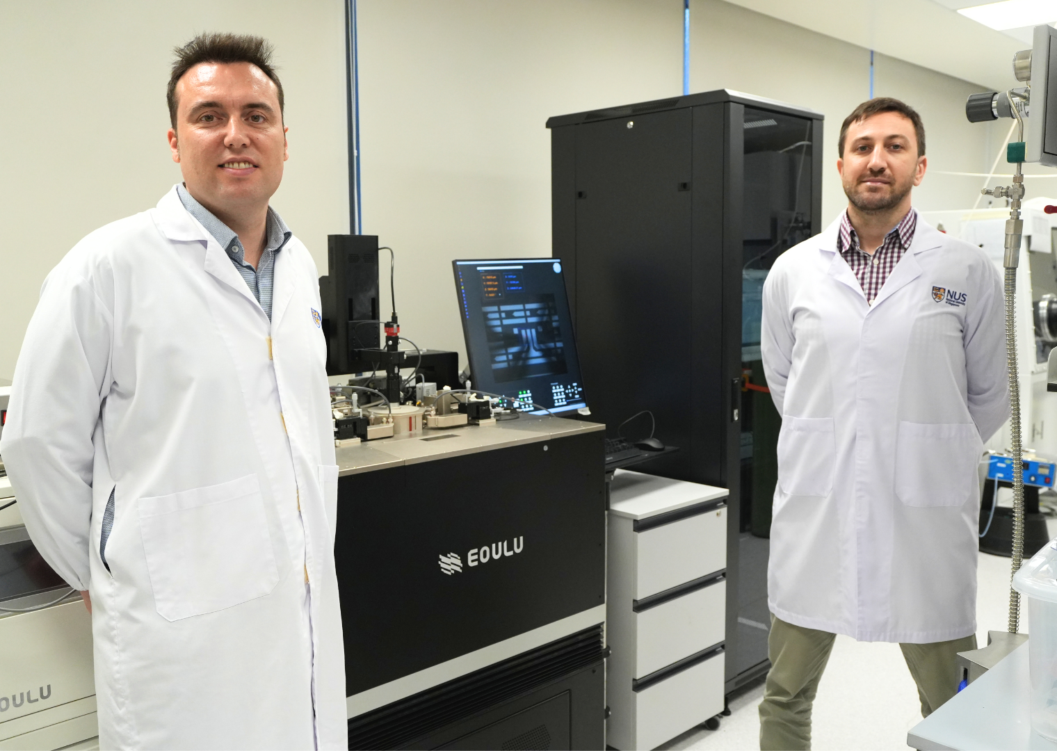 Assoc Prof Mario Lanza (left) and Dr Sebastian Pazos (right), whose team integrated 2D materials on gallium nitride microchips to develop high-frequency switches for 5G and 6G telecommunication.