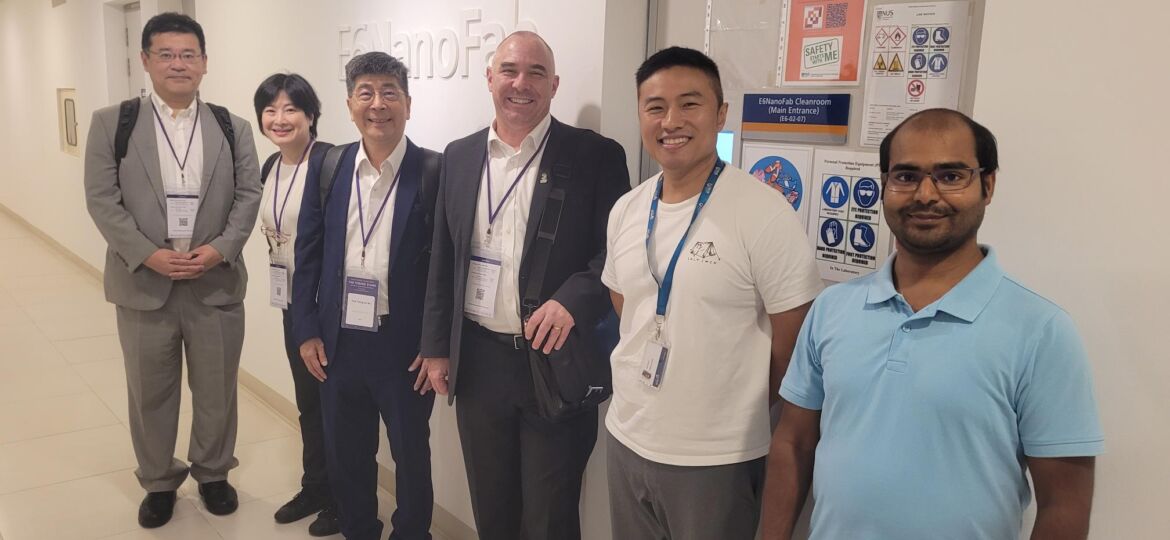 Group Photo with E6NanoFab Signage -1000029911