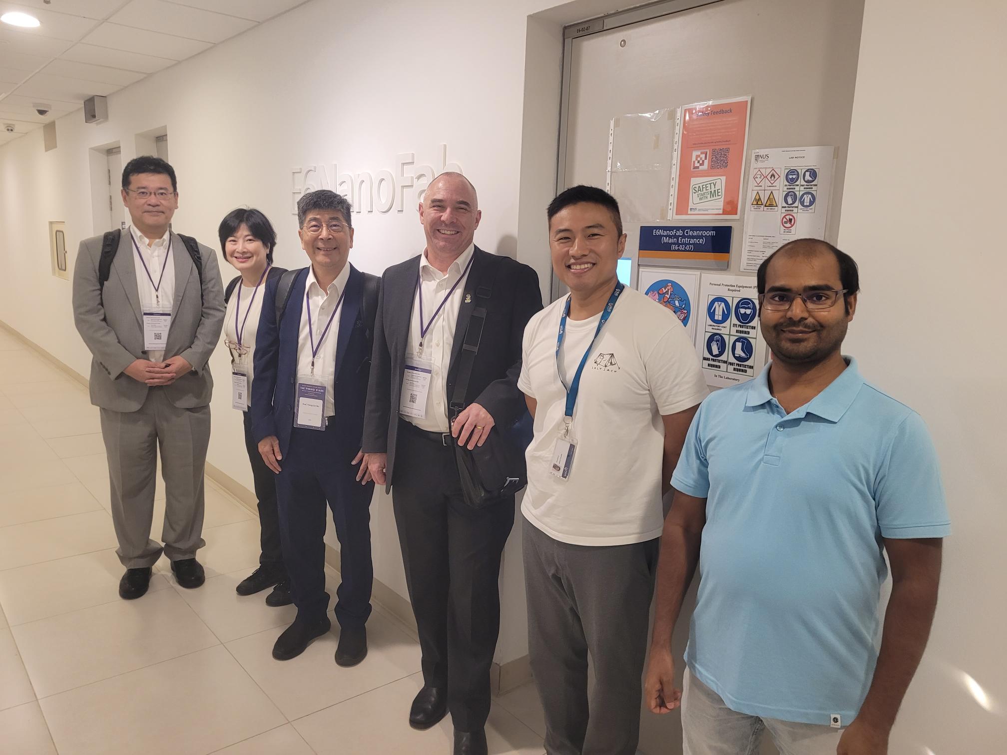 Group Photo with E6NanoFab Signage -1000029911