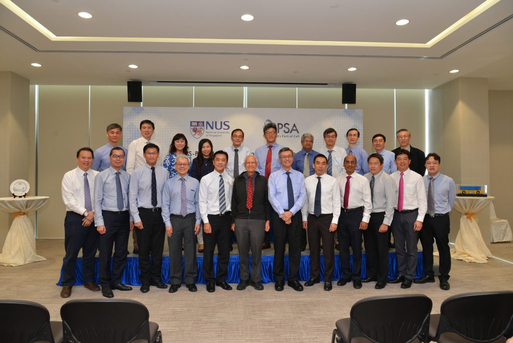 NUS Engineering Dean Prof Chua Kee Chaing (front row, 4th from left) and Faculty members were present to witness the MOU signing by Prof Tan Eng Chye (front row, 6th from right) and Mr Ong Kim Pong (front row, 5th from left).