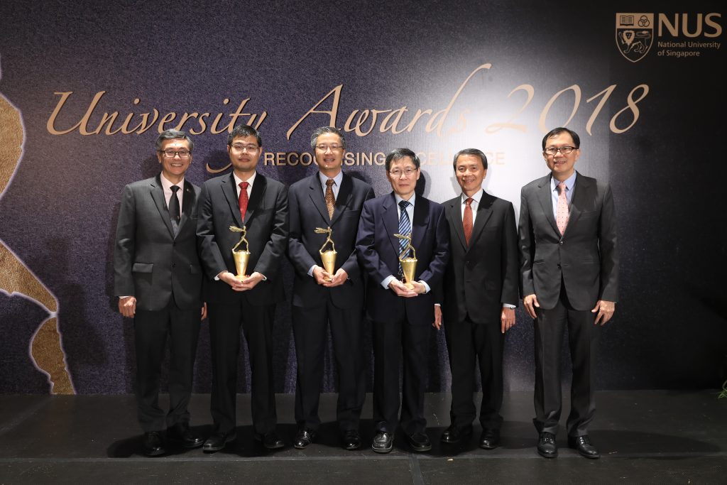 Asst Prof Zhao (second left) with NUS President Prof Tan Eng Chye and other awardees.