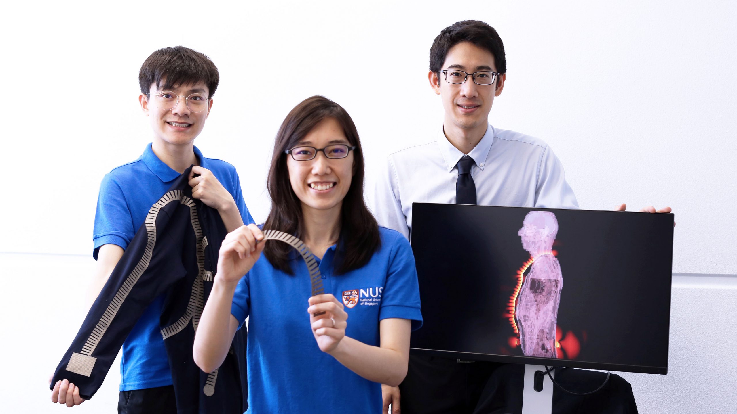 From left: PhD student Mr Tian Xi, Research Fellow Dr Lee Pui Mun and Assistant Professor John Ho, together with seven NUS researchers, took a year to develop the ‘smart’ textiles