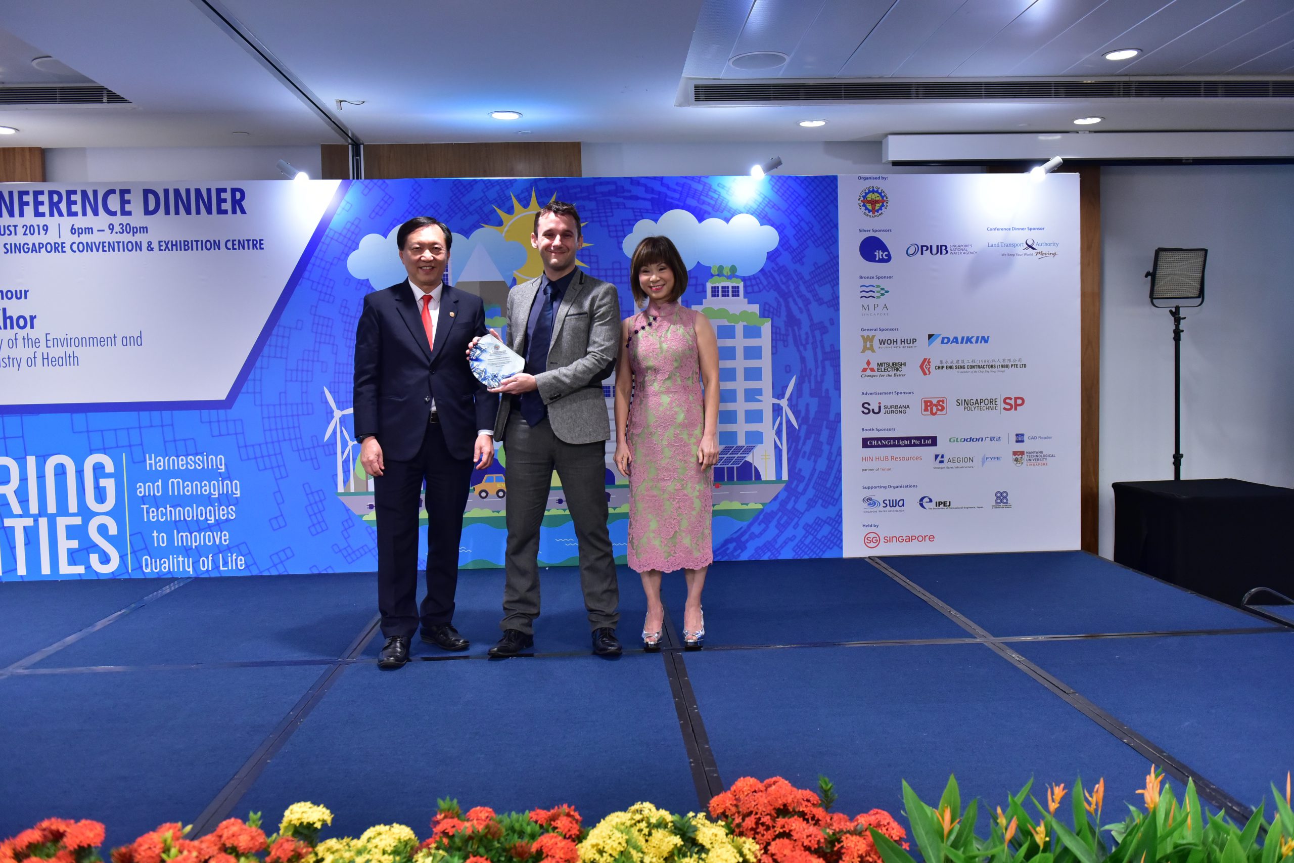 <div>Assistant Professor Olivier Patrick Lefebvre (centre) receiving the Prestigious Engineering Achievement Award 2019 from Professor Yeoh Lean Weng, President of IES, Singapore (left) and Dr Amy Khor,</div><div>Senior Minister of State in the Ministry of Health and Ministry of the Environment and Water Resources (right).</div>