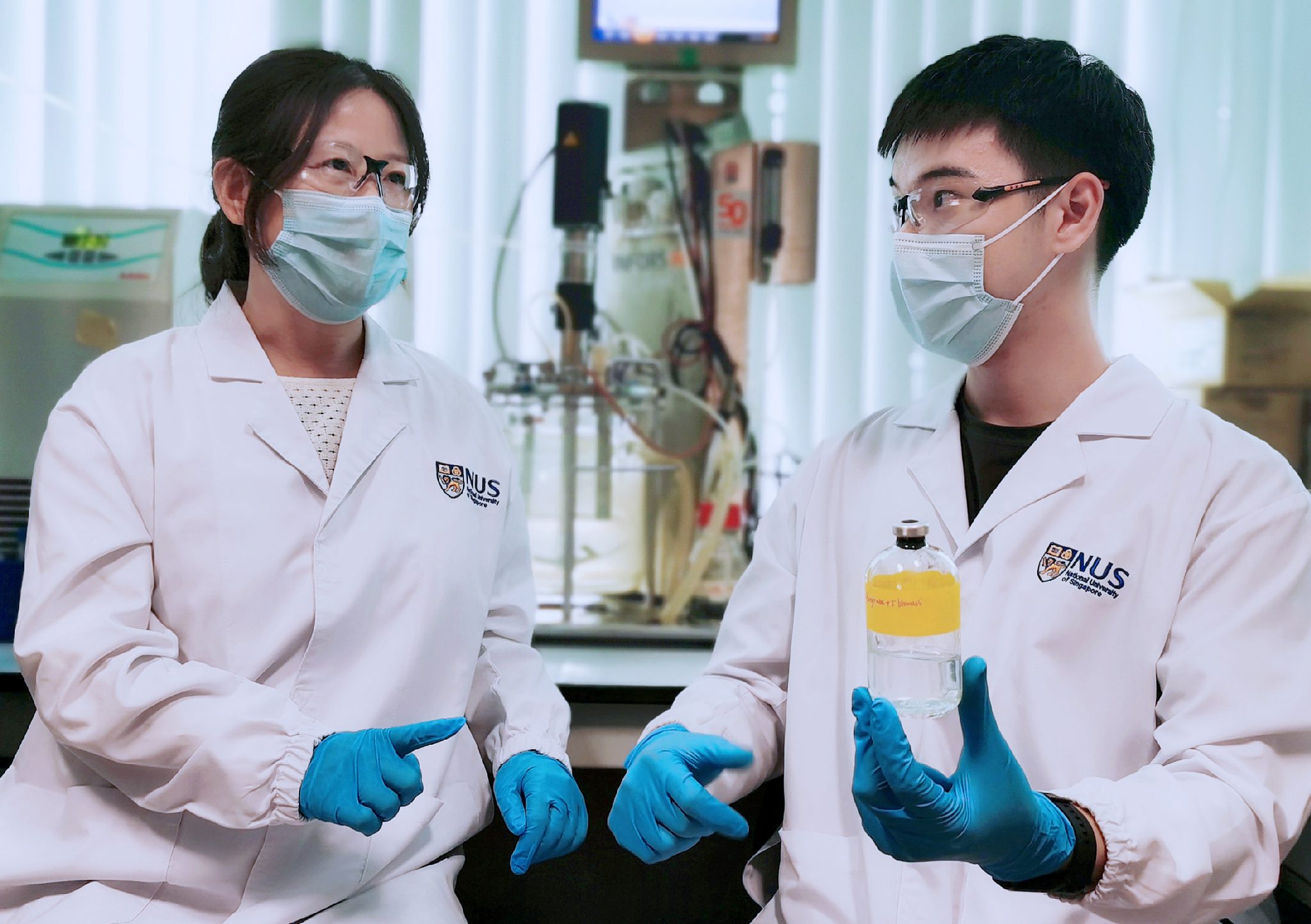 <div>The team led by Associate Professor He Jianzhong (left) and Research Fellow Dr Wang Qingkun (right) discovered Thauera sp. strain SND5 after they isolated and tested various strains of bacteria</div><div>from wastewater samples.</div>