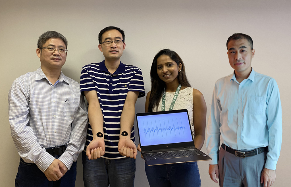 <div>NUS Engineers from the Department of Material Science and the Department of Biomedical Engineering collaborated to create the new dry PWS electrodes. From left to right: Associate Professor</div><div>Ouyang Jianyong (MSE), Dr Zhang Lei (MSE), PhD candidate Kirthika Senthil Kumar (BME), and Assistant Professor Ren Hongliang (BME).</div>