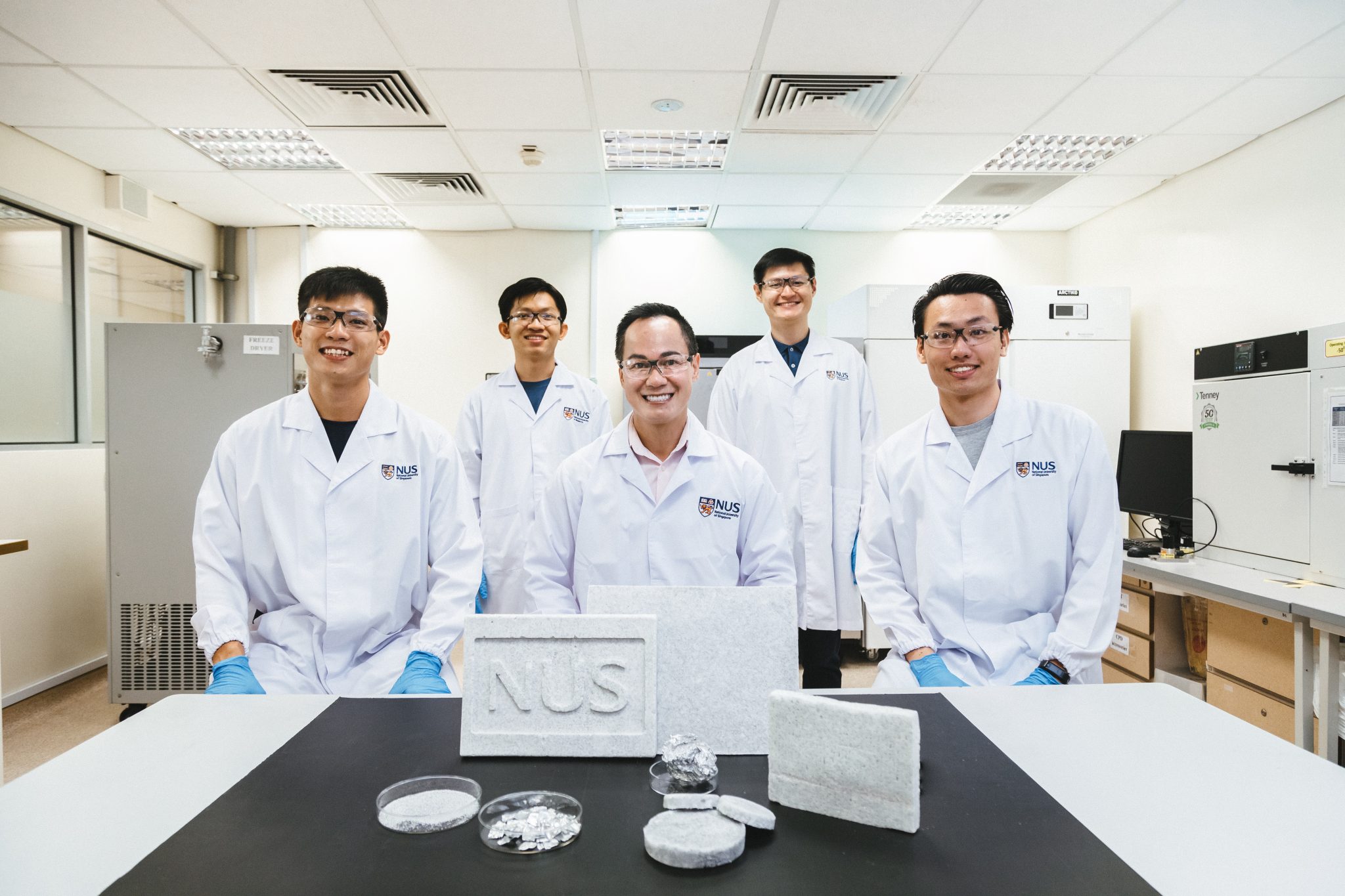 <div>Associate Professor Duong Hai-Minh (seated, centre) and his research team from NUS Mechanical Engineering with their aerogels from metal waste. Team members from left to right: Goh Chong Jin,</div><div>Nguyen Thai Thien Phuc, A/Prof Duong Hai-Minh, Goh Xue Yang, Ong Ren Hong.</div>
