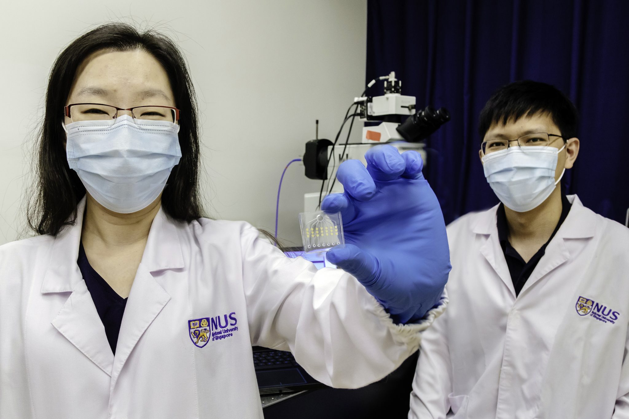 Assistant Professor Shao Huilin (left) and Dr Sijun Pan (right) and their team from NUS Biomedical Engineering and Institute for Health Innovation & Technology developed ExoSCOPE