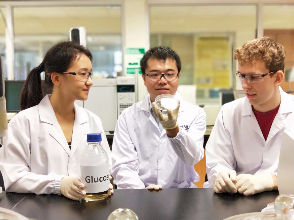 Assoc Prof Yan Ning (middle) and his team developed a sustainable approach that can produce a series of amino acids from grass, straw and wood chips.