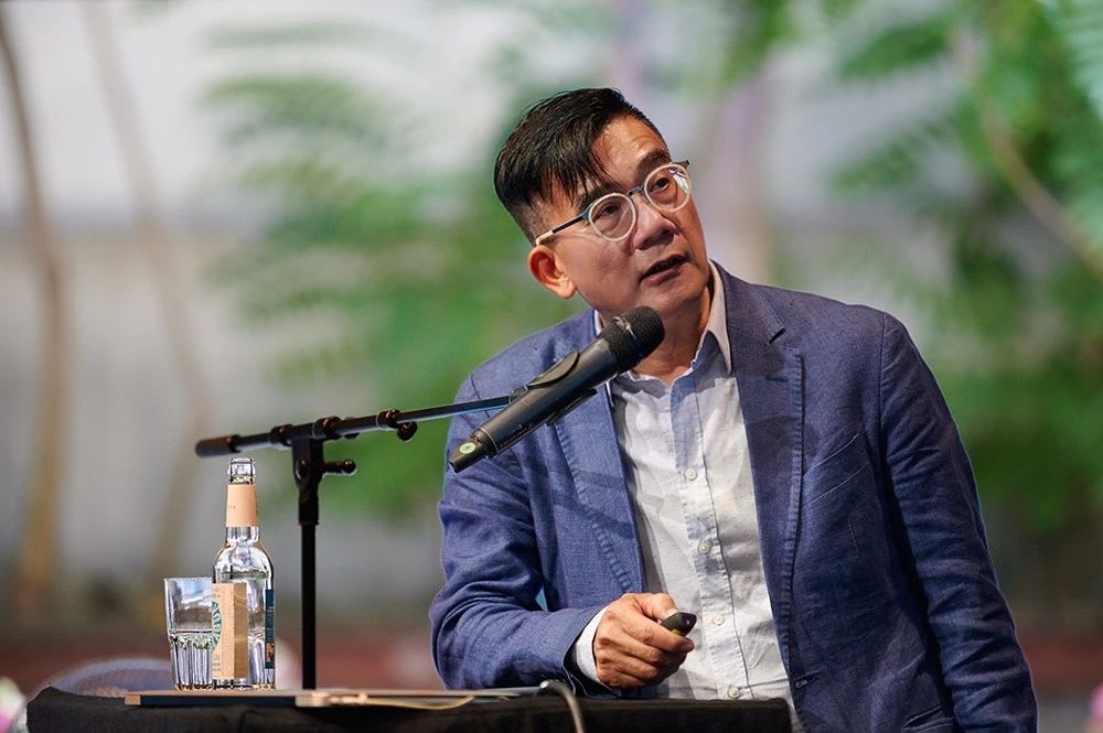 Prof Ho, speaking at a symposium in Berlin, Germany (2019) on the development of Singapore’s housing construction.