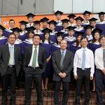 Prof Lee with colleagues and students at Commencement 2012
