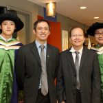 Prof Lee with some PhD students at Commencement 2014