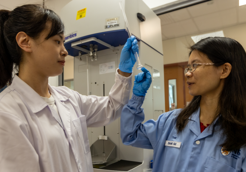 The research was led by Asst Prof Zhang Sui (right) pictured with a member of the research team, PostDoc Research Fellow Qi Ding.