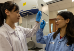 The research was led by Asst Prof Zhang Sui (right) pictured with a member of the research team, PostDoc Research Fellow Qi Ding.
